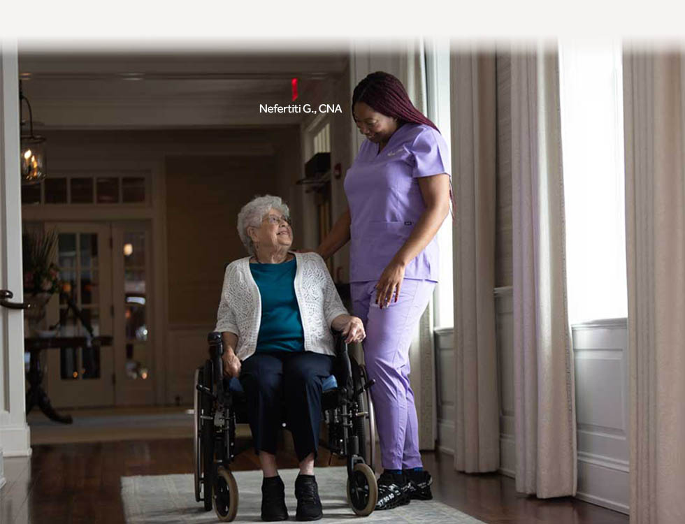 Nurse-with-patient-in-wheelchair