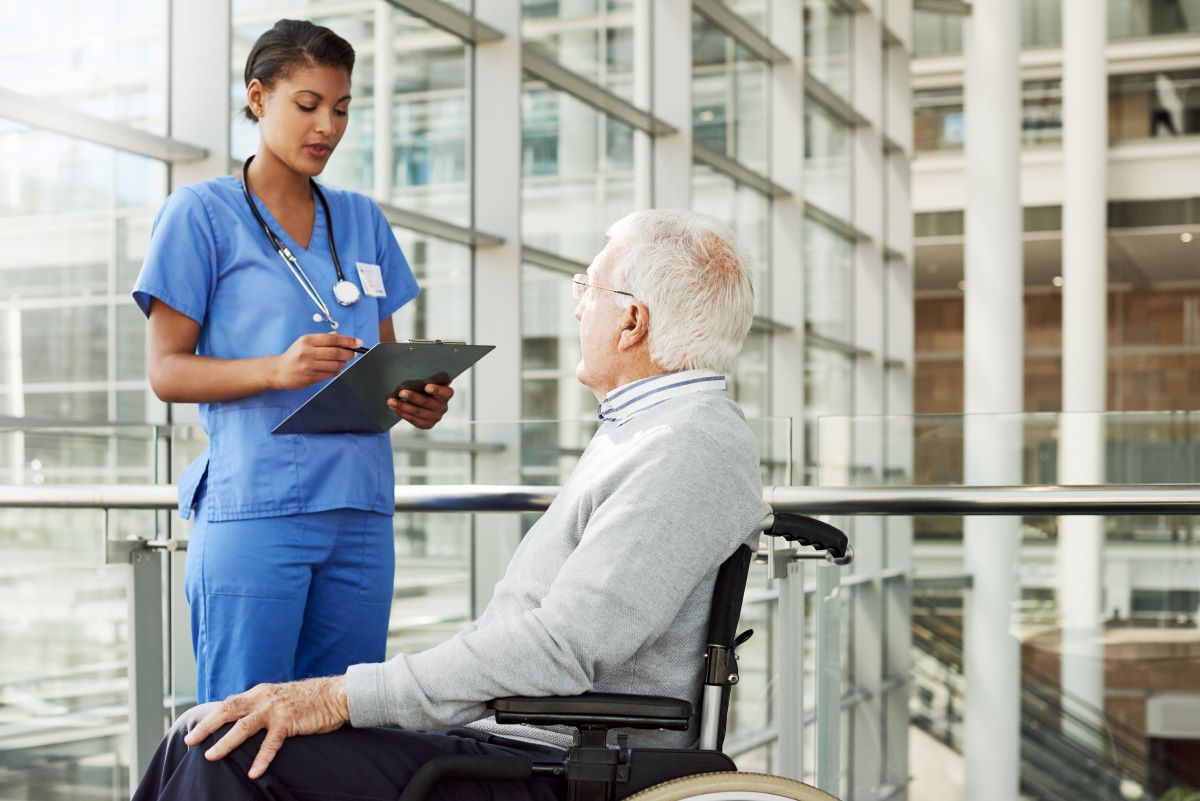 Nurse talking to resident at a facility with an NPI number
