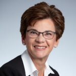 Image of content reviewer smiling for camera