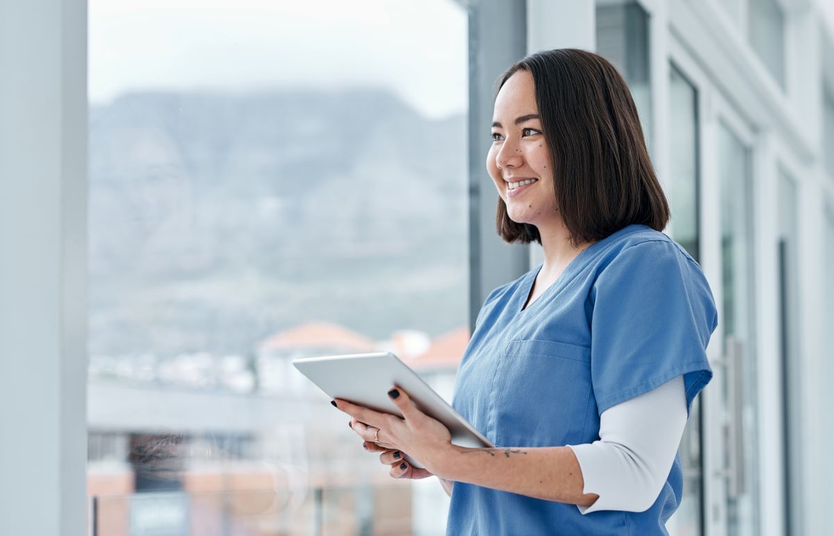 Nurse manager using tablet