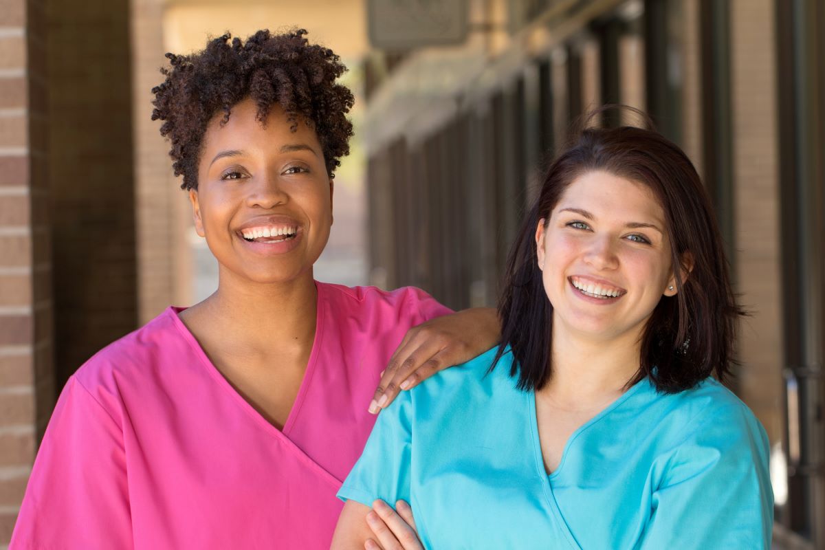 Two nurses smiling