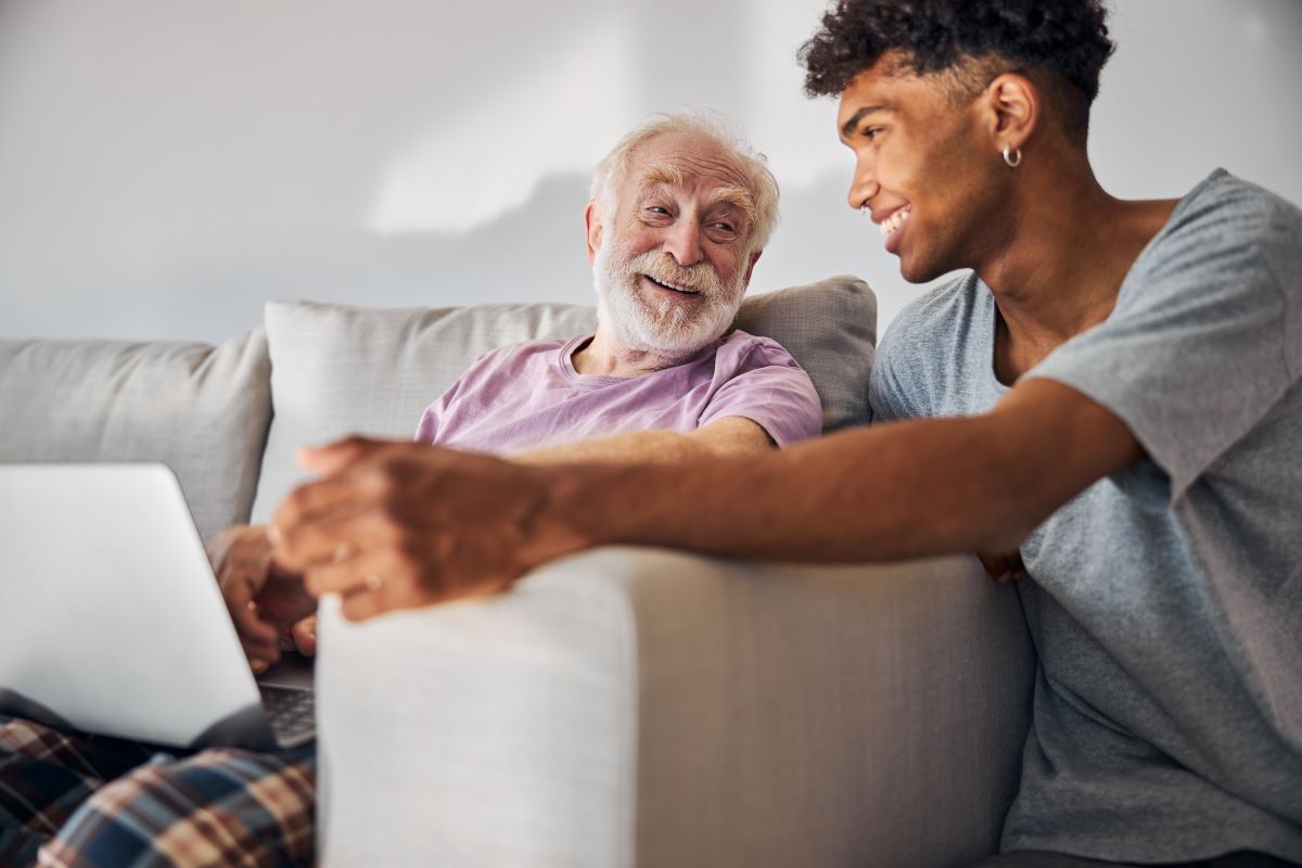 A caregiver spends quality time with an elderly nursing home resident.