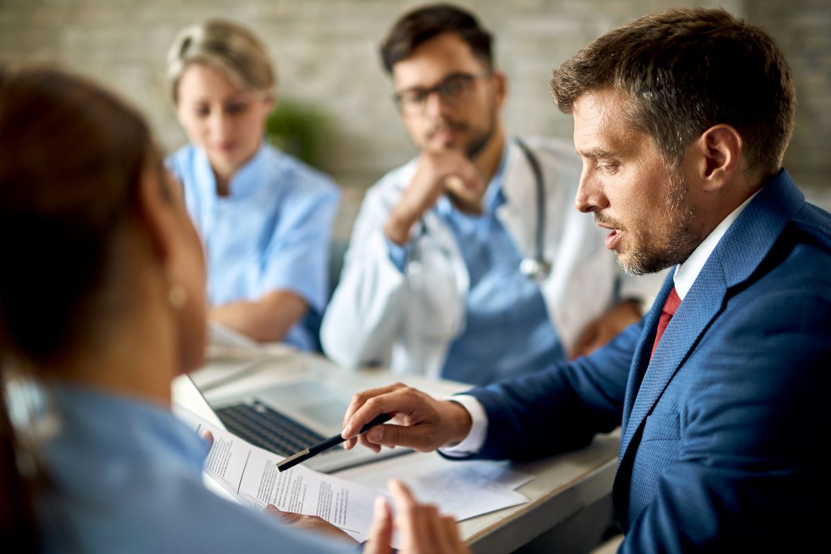 Group of medical professionals talking during a meeting