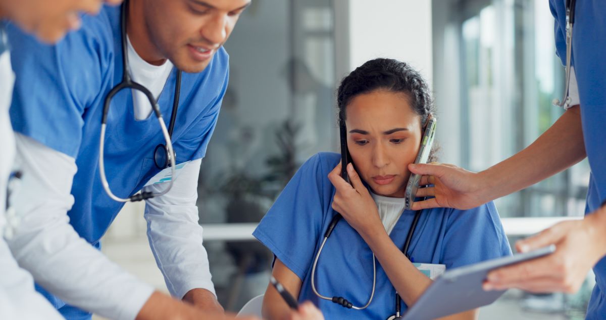 Busy group of nurses working in a facility