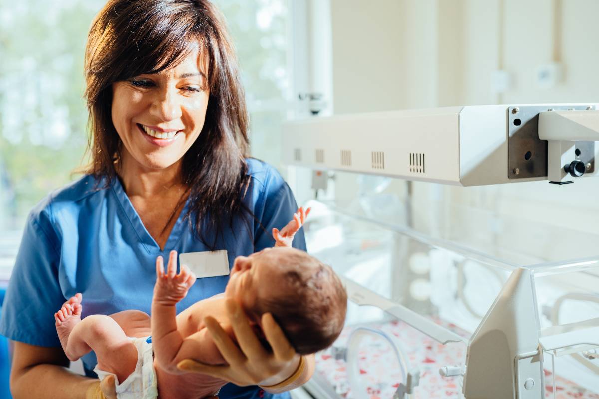 A nurse works the job she got with her neonatal nurse cover letter.