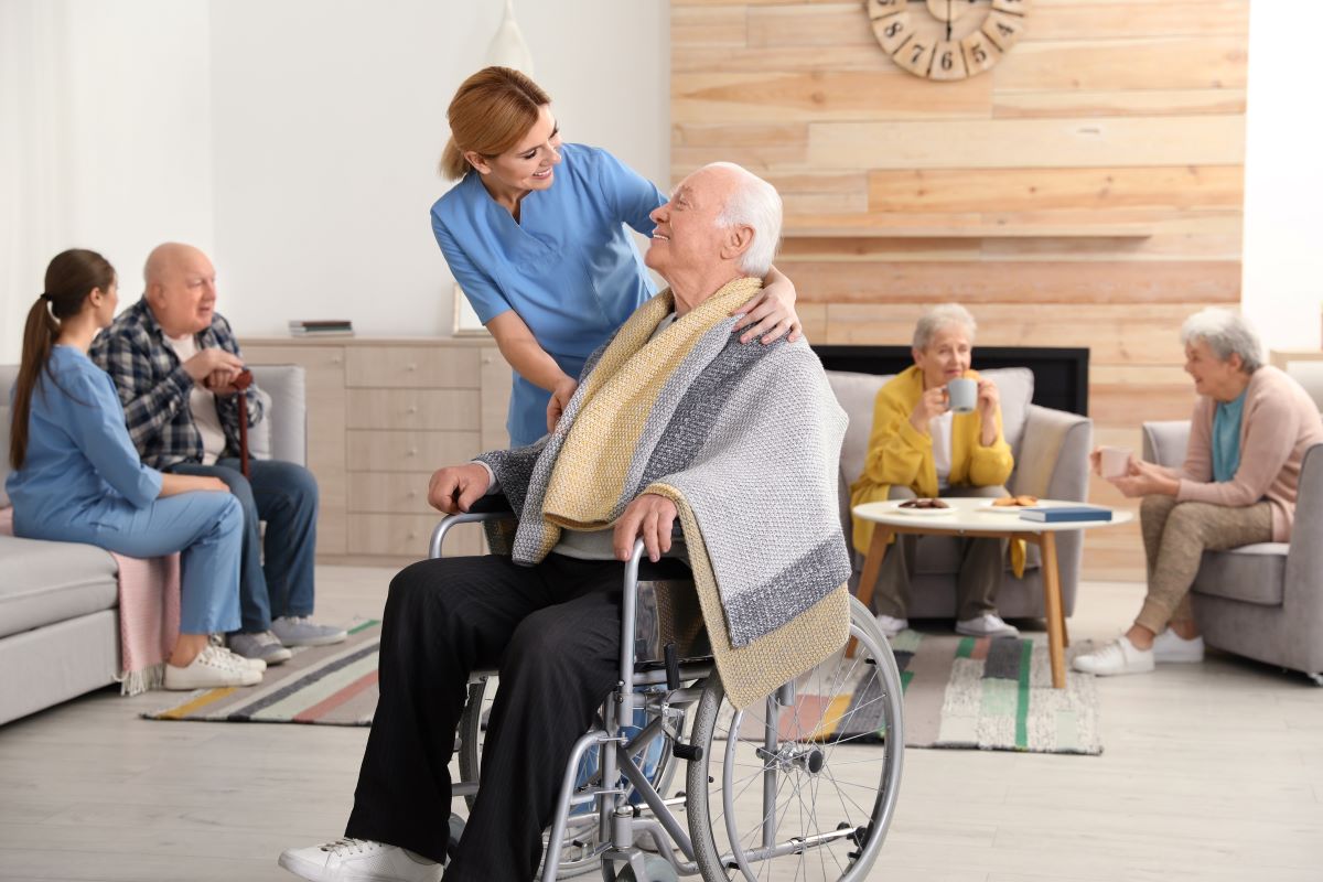 Nurse caring for a resident in a nursing home