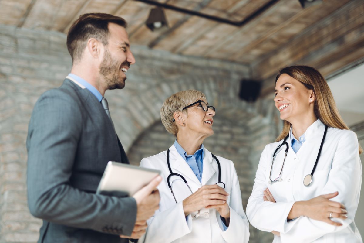 A privacy officer meets with senior physician staff.