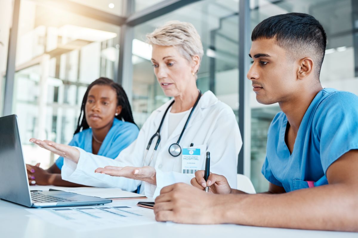 Newly hired nurses receive training from a supervising physician.