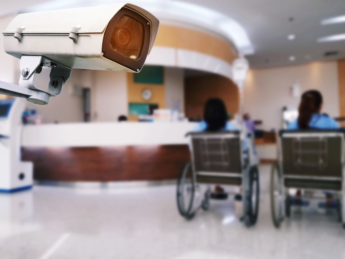 A surveillance camera in the hallway of a hospital.