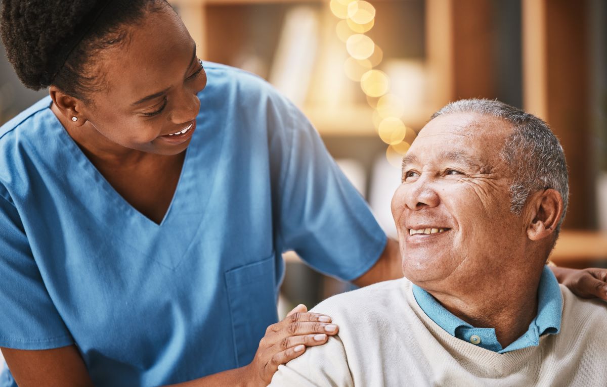 A nurse shares a moment with one of her patients.