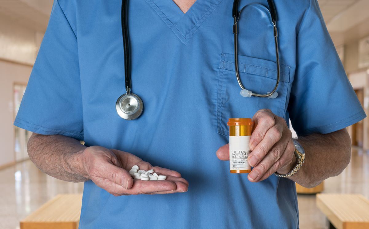 The SUPPORT Act provides guidelines for the dispensing of opioids, shown here in the hands of a nurse.