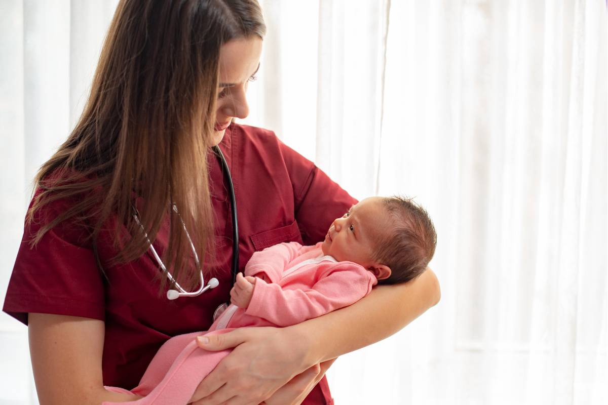 A nurse uses her postpartum nurse cover letter skills to care for a newborn.