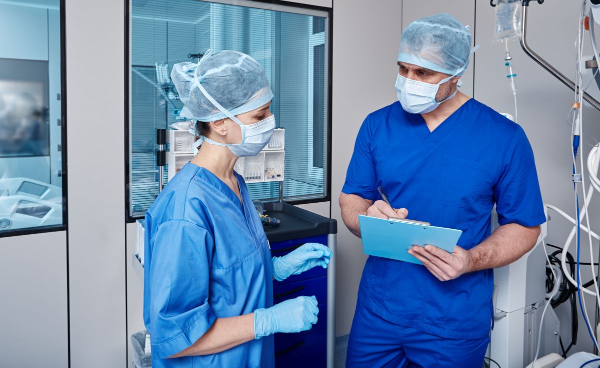 Two CCU nurses in an operating room.