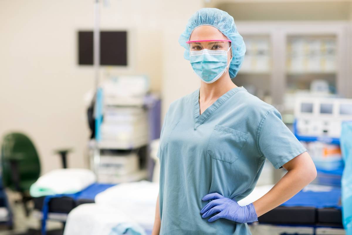 A healthcare professional displays their surgical tech resume skills in the OR.