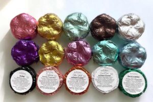 Shower steamers in a variety of colors.